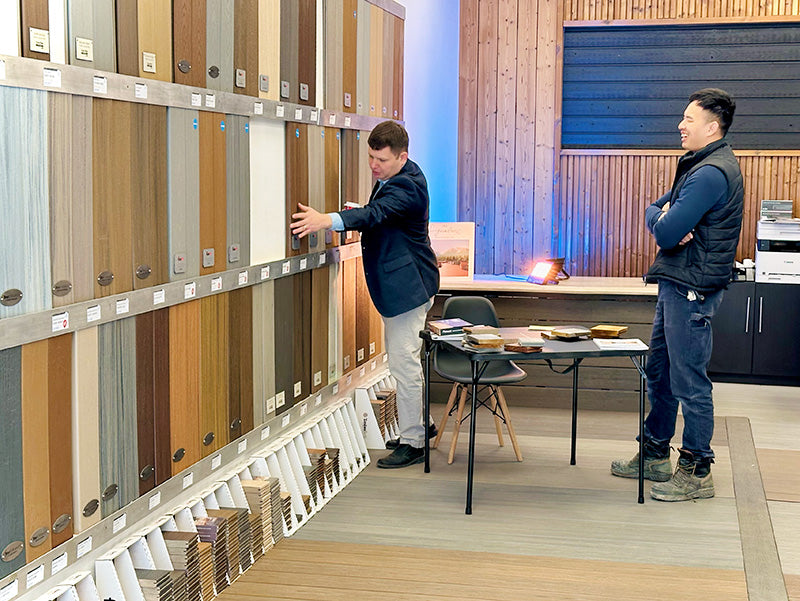 Vaughan Deck Shop sales rep showing decking boards