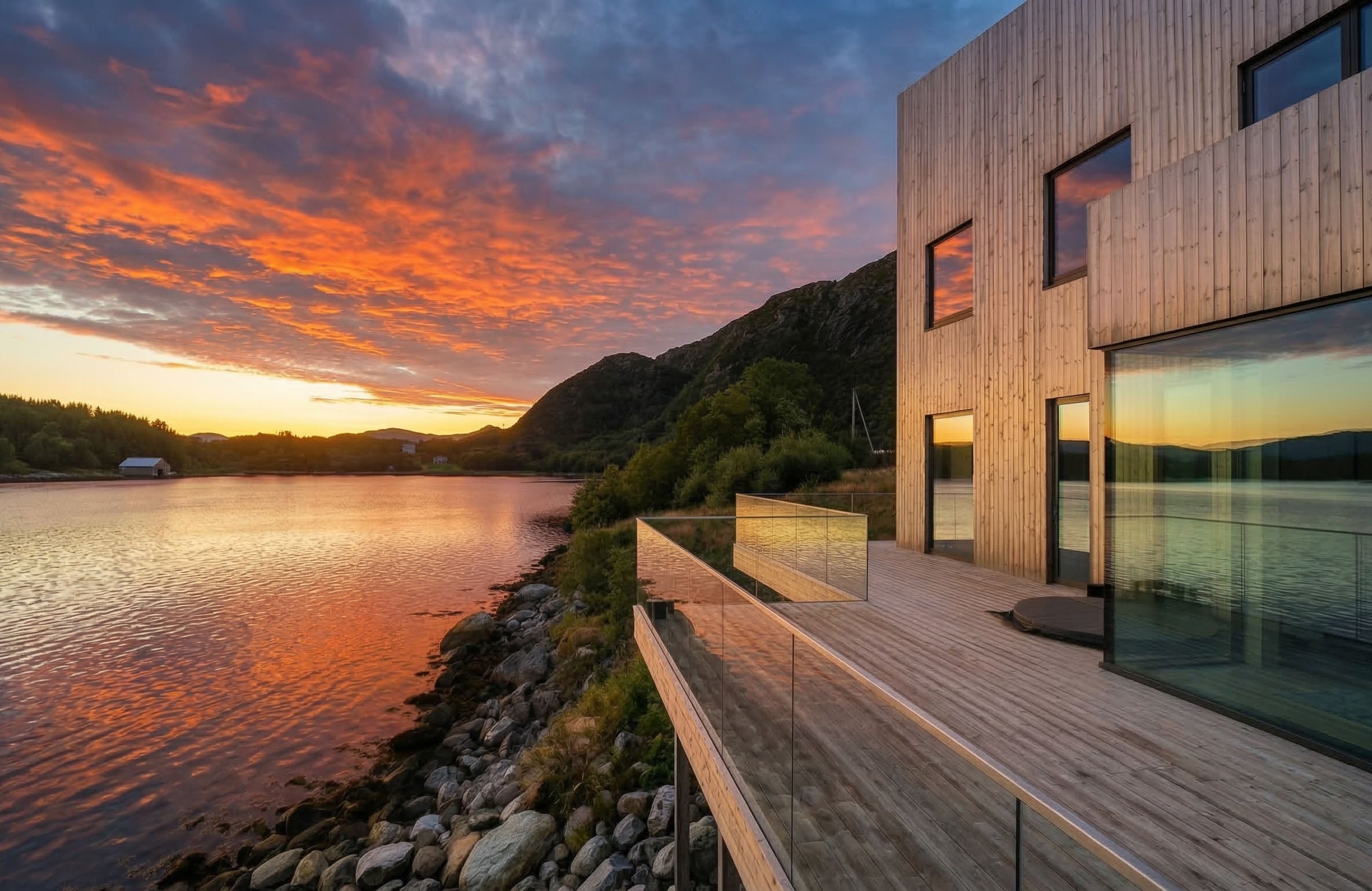 Lunawood ThermoWood decking  example - cottage on the lake with a sunset
