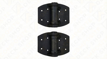 Two black metal spring-loaded gate hinges for TruNorth Slide & Go Fence gate system, each with four mounting holes per side. 