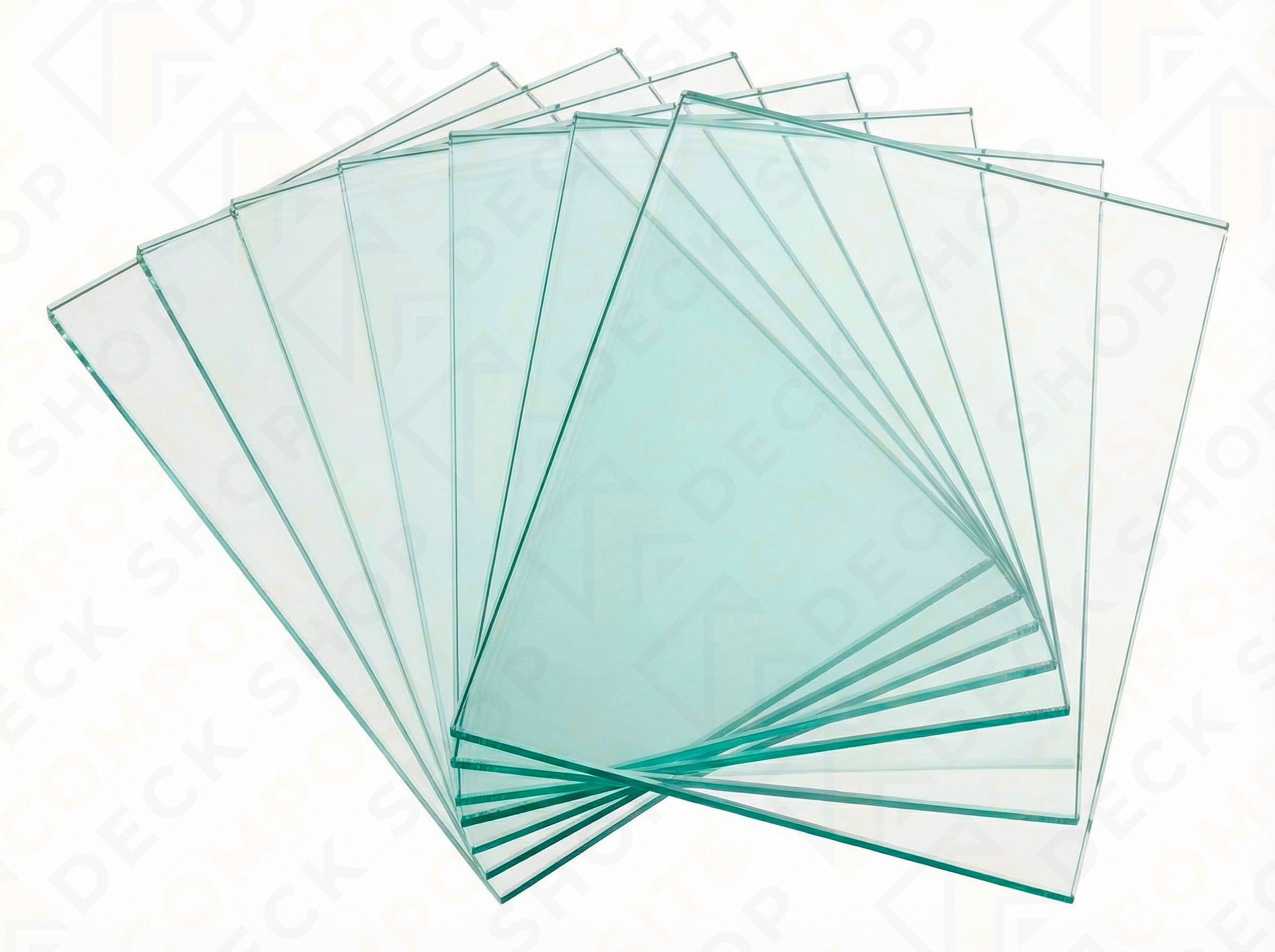Stack of clear glass sheets on a white background