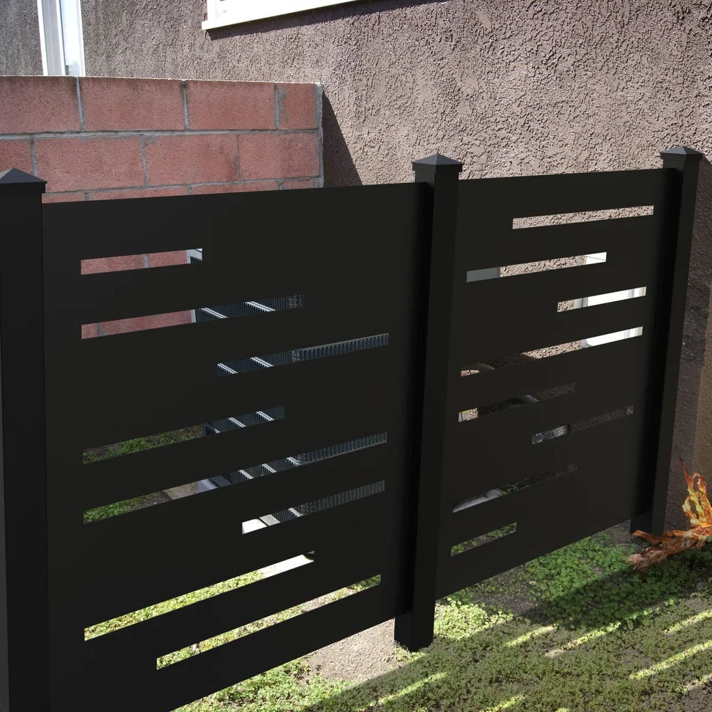 Black metal powder-coated aluminum fence panels with horizontal slats create an outdoor privacy panel by the brick wall.